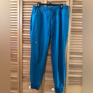 Dark teal Barco One scrub pants.